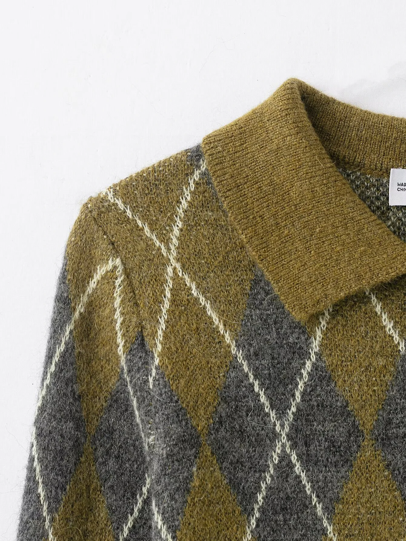 Nuovo abbigliamento invernale da donna in stile europeo e americano, temperamento casual, semplice polo in maglia di diamanti a maniche lunghe