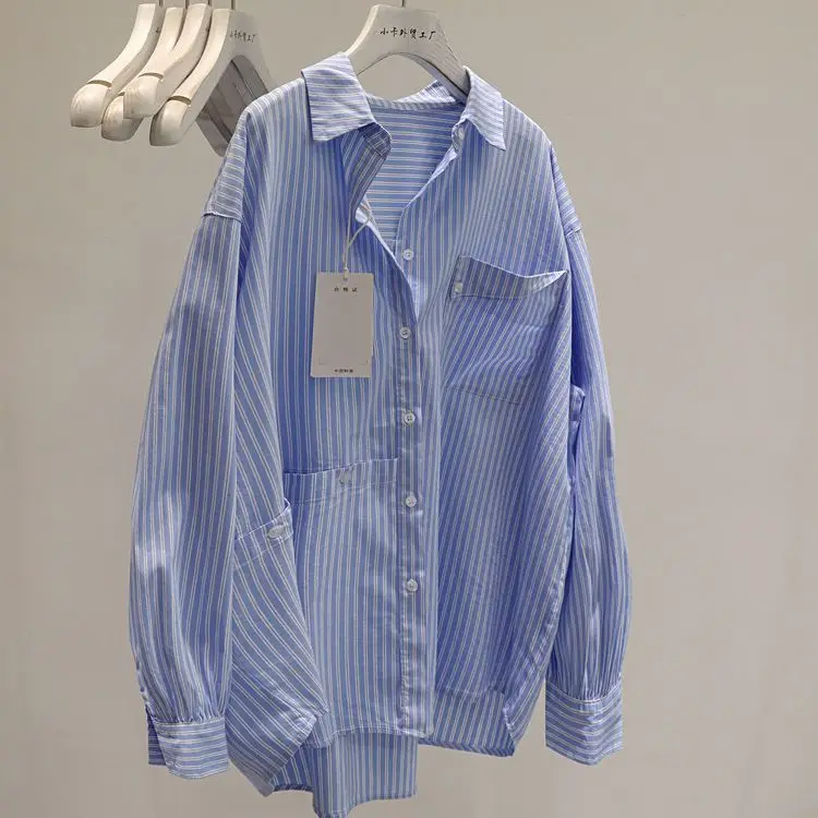 

Design-sensual Light Blue Striped Shirt for Women Single Pocket Loose Mid-length Shirt for Spring Korean Style Fresh
