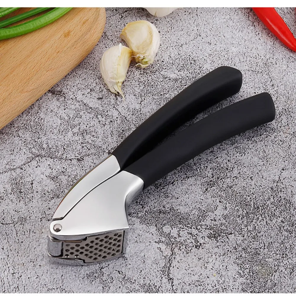 

Manual Garlic Press Stainless Steel Non-slip Handle Garlic Squeezer Ergonomic Grip Handheld Garlic Crusher Ginger