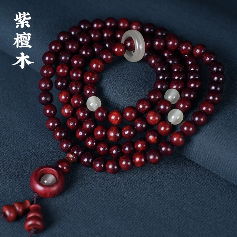 

Small Leaf Red Sandalwood Blood Sandalwood Luminous Rotating Pendant Luminous Running Ring Wooden Ancient Style Necklace Bracele