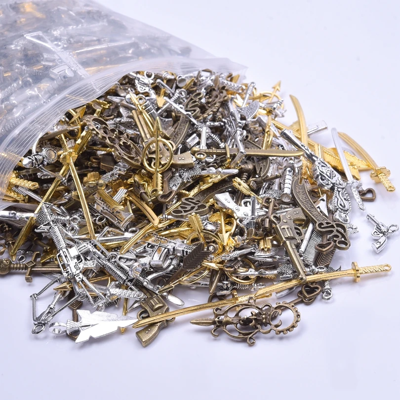 20/40ชิ้นสีผสมดาบกริชวินเทจแบบสุ่มเสน่ห์จี้รูปธนูมีดย้อนยุคสำหรับการทำเครื่องประดับ DIY ขายส่ง