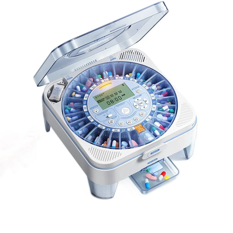 The smart pill dispenser regularly reminds the elderly to take medicine. Portable medicine dispensing box Electronicmedicine box