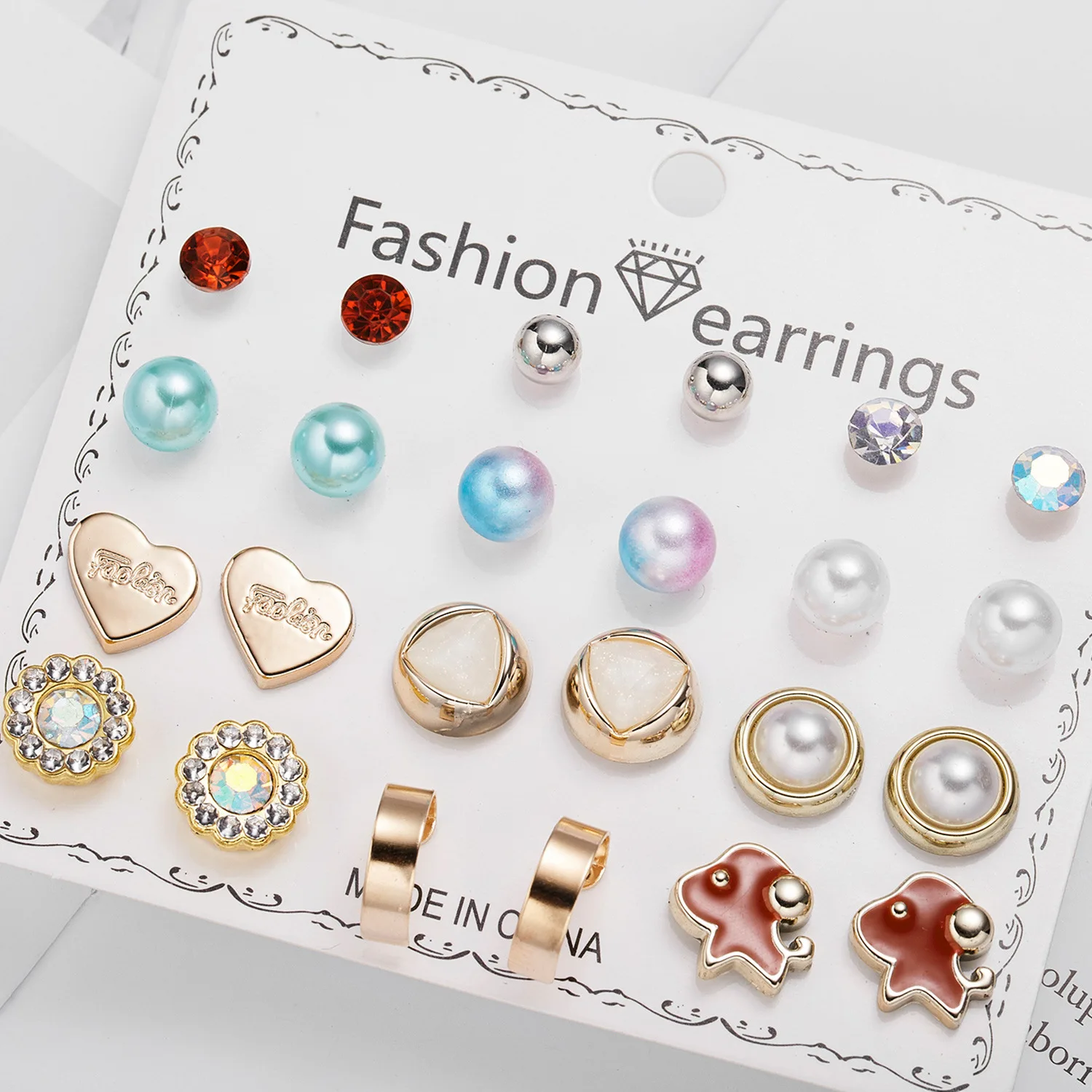 Factory direct sales, hot-selling 12 pairs of imitation pearl rhinestone gold ball combination card stud earrings, earrings set