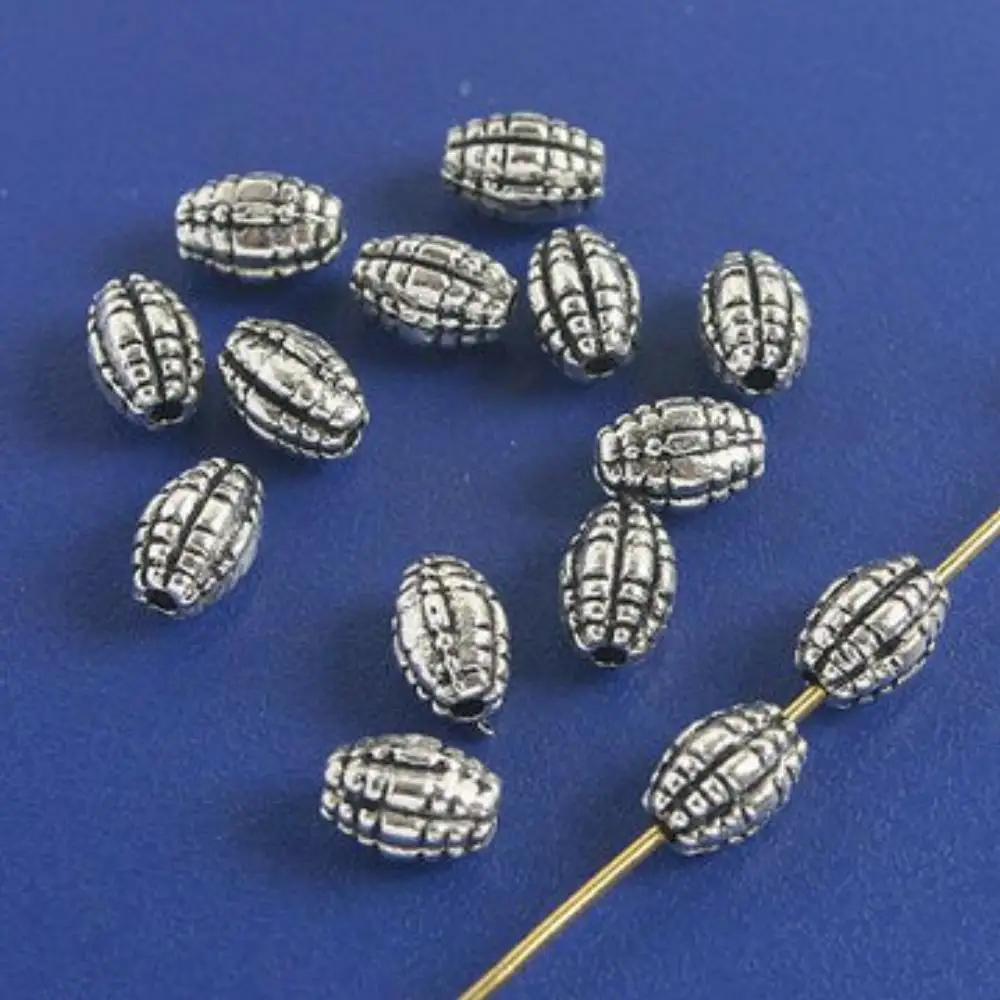 

30PCS 7.1x5mm,hole:0.7mm DARK SILVER 7.1MM LONG SILVER SPACER BEADS H5023