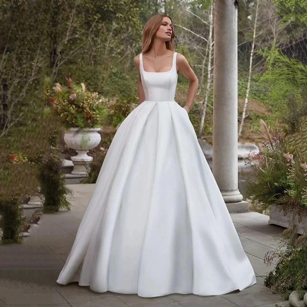 

Elegant Simple Wedding Gowns Elegant Satin A Line Bride Dress Spaghetti strap Backless Bridal Dress Wedding Dress Customized