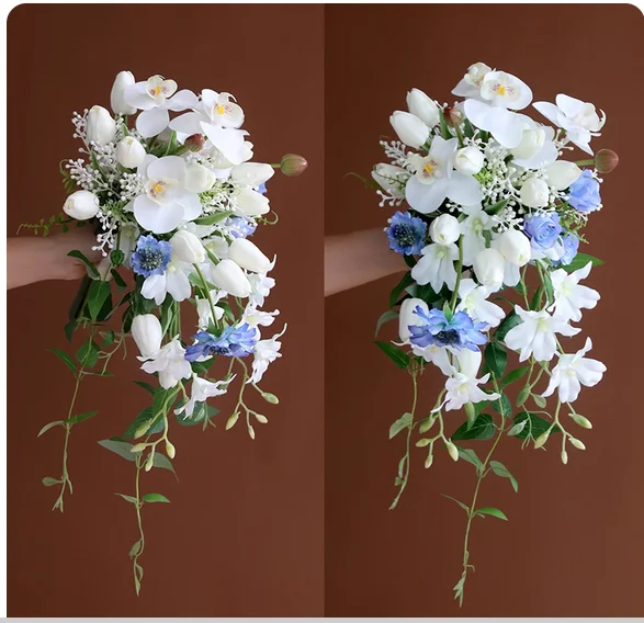 

Small Waterfall Phalaenopsis holds simulated fake bouquets for wedding celebration. Photographic props are placed in the desktop