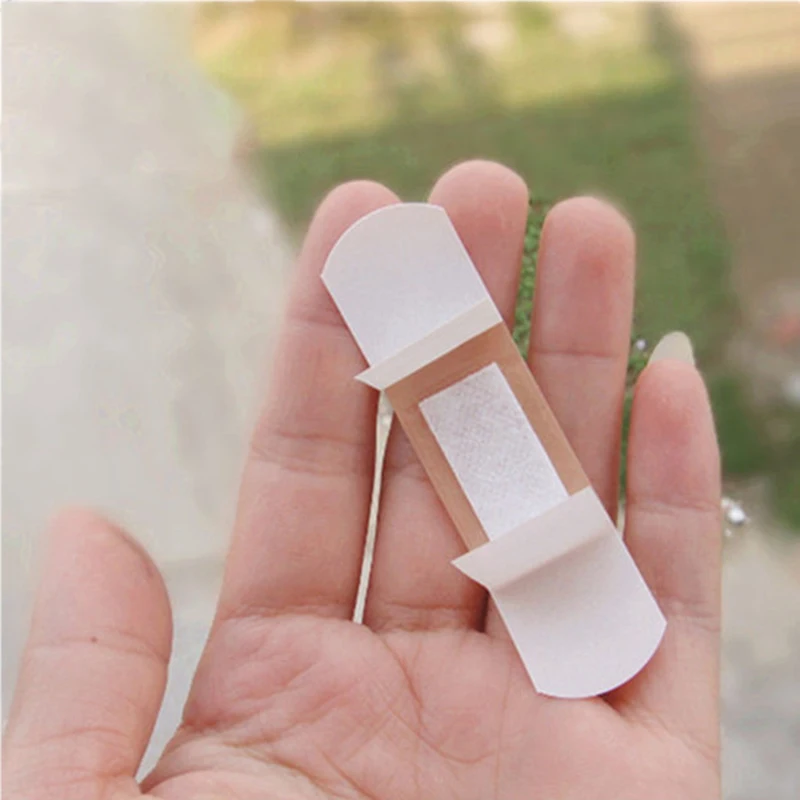 50/100/200 قطعة تنفس الفرقة المعونة ضمادة مضادة للماء الإسعافات الأولية الجرح خلع الملابس الشريط الطبي الجرح الجص مجموعات الطوارئ الضمادات