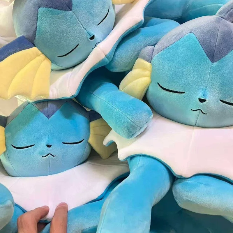 peluche-pikachu-pokemon-peluche-eevee-jazwares-australie-serie-eevee-endormi-peluche-vaporeon-endormi