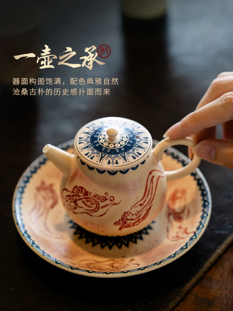 Tetera de cerámica de estilo chino, taza de té Dunhuang Kweichow Moutai, rojo esmaltado, una olla, dos tazas, juego de Kung Fu de alta gama
