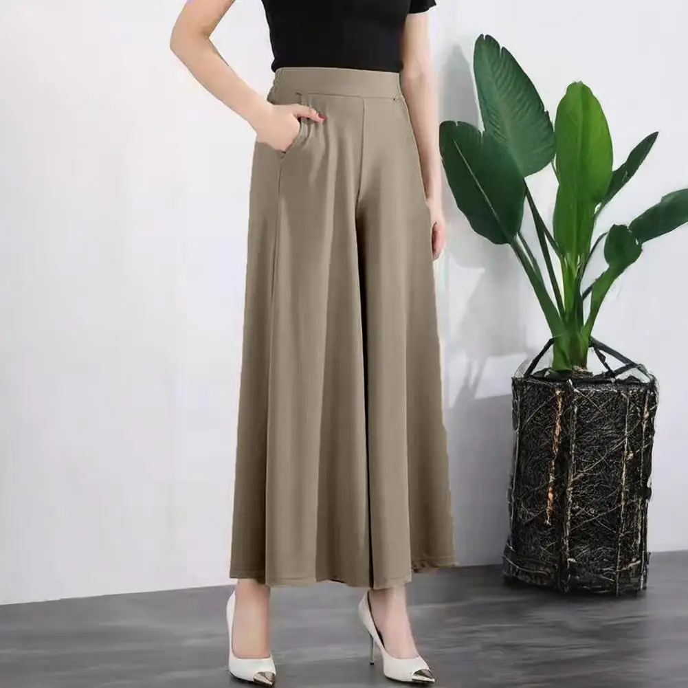 Брюки с широкой талией. Женские широкие брюки с высокой талией и карманами. Однотонные костюмные брюки для ношения. Удобный стиль. Однотонные.