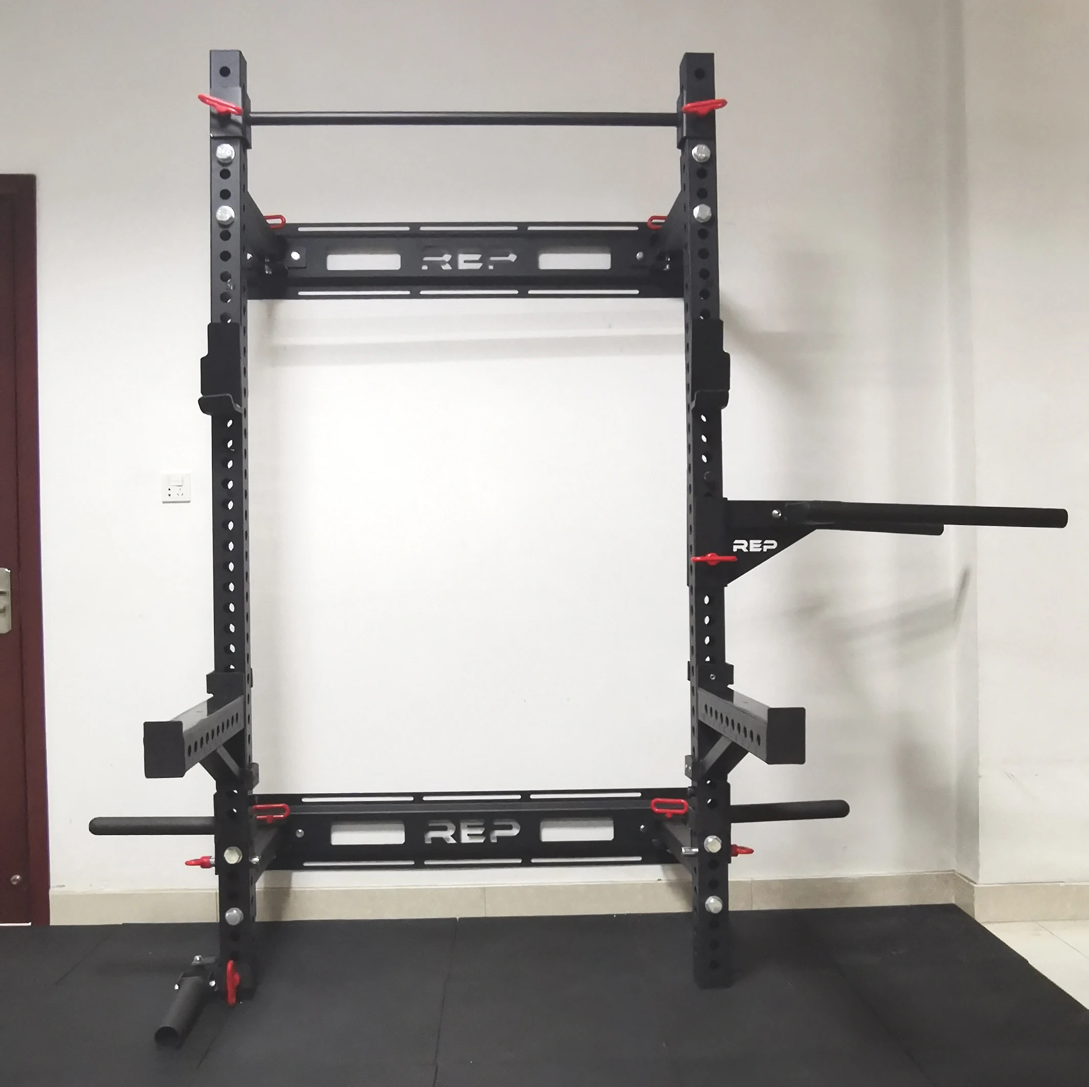 

Folding squat stand against the wall, bench press, pull up parallel bars (wall thickness 3mm)