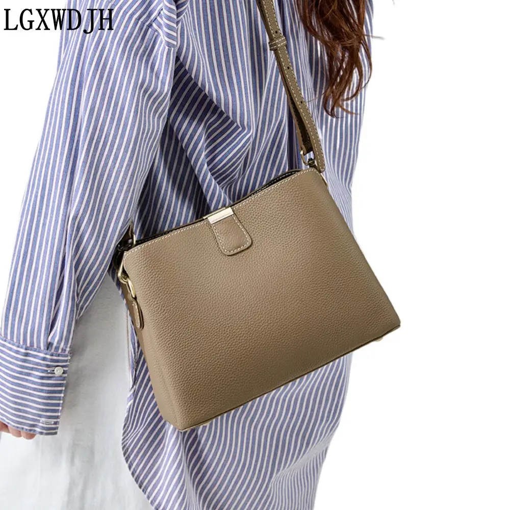 The first layer of cowhide 2024 New Bags for women Double shoulder strap bucket type cheap shoulder bag All-match Crossbody bag