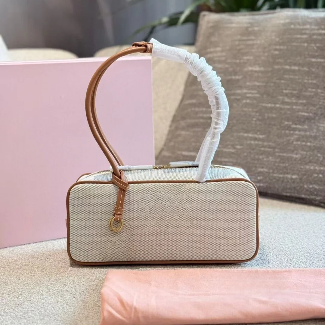 

Advanced texture portable briefcase Women's bag 2025 new fashion spring and summer canvas large capacity slung shoulder bags