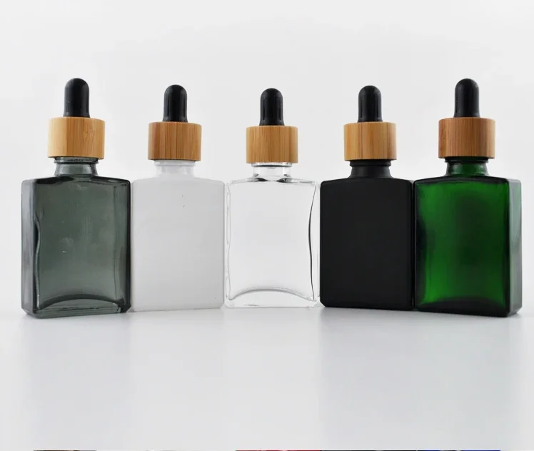 

1000pcs Matt Black glass bottle bamboo black dropper lids 1000pcs Matt amber bottle bamboo white dropper 1000pcs Matte green