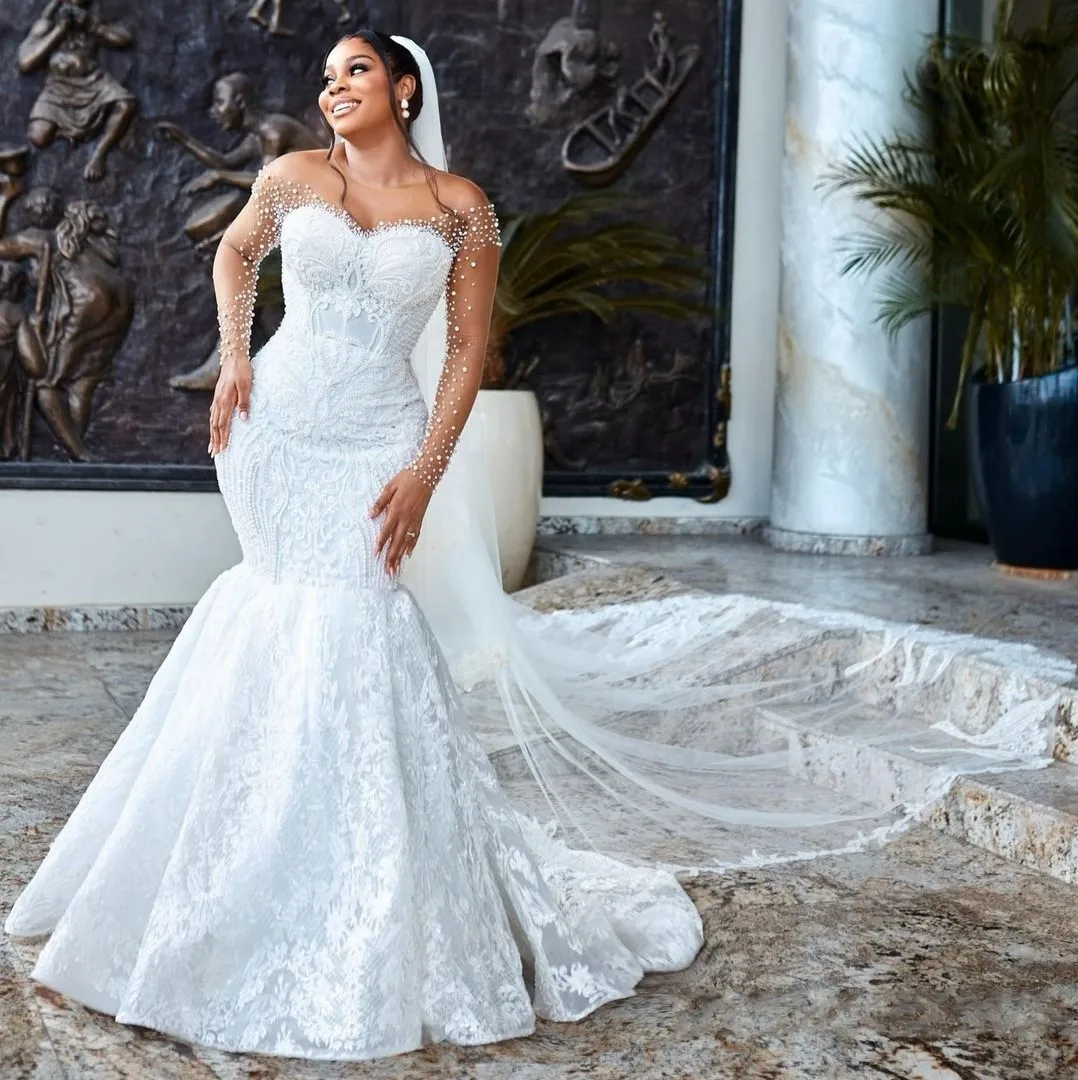 

Aso Ebi Mermaid Wedding Dress Bridal Gowns For Bride Sheer Neck Illusion Long Sleeves Beads Pearls Lace Vestidos De Noiva