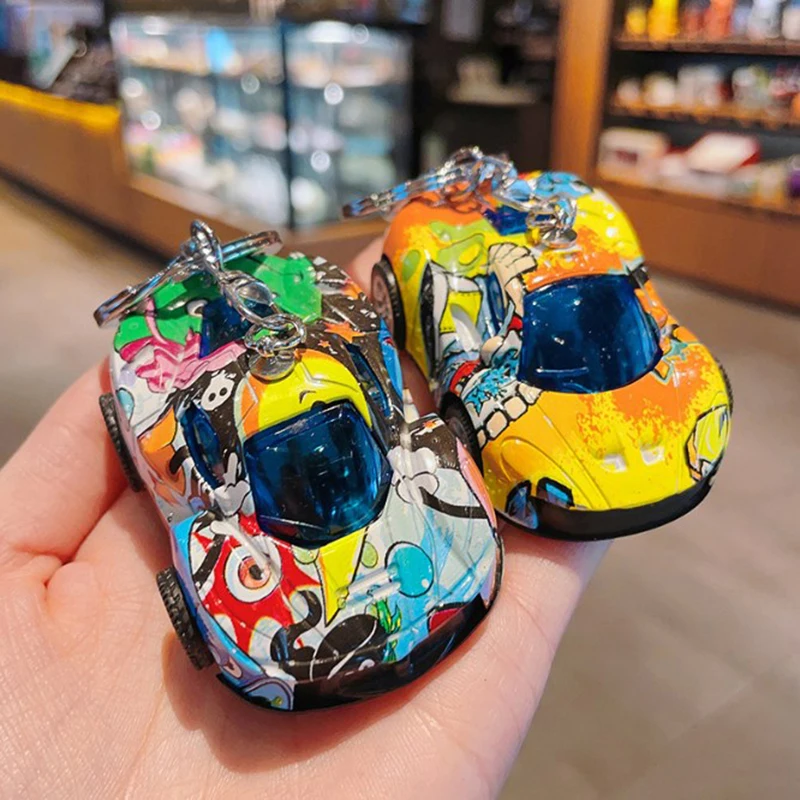 Creative Alloy Pattern Pull Back Sports Car Key Chain, Exquisite Children's Toy Car Key Chain Pendant Claw Machine Small Gift.