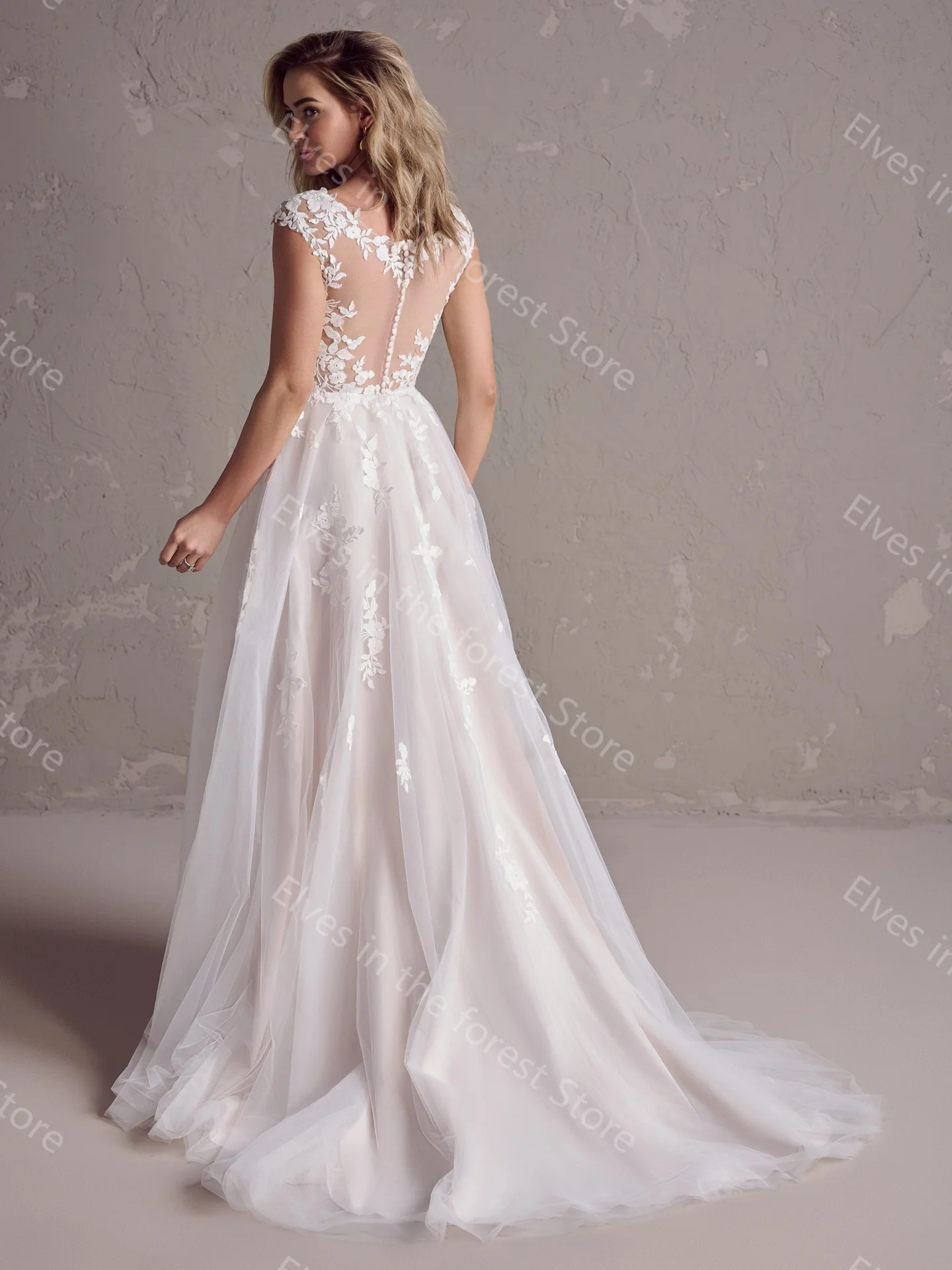 Elegant A Line Wedding Dresses Lace Appliques Sequins Sleeveless Bridal Gowns Sexy See Thru Back Sweep Train Robes de Mariee