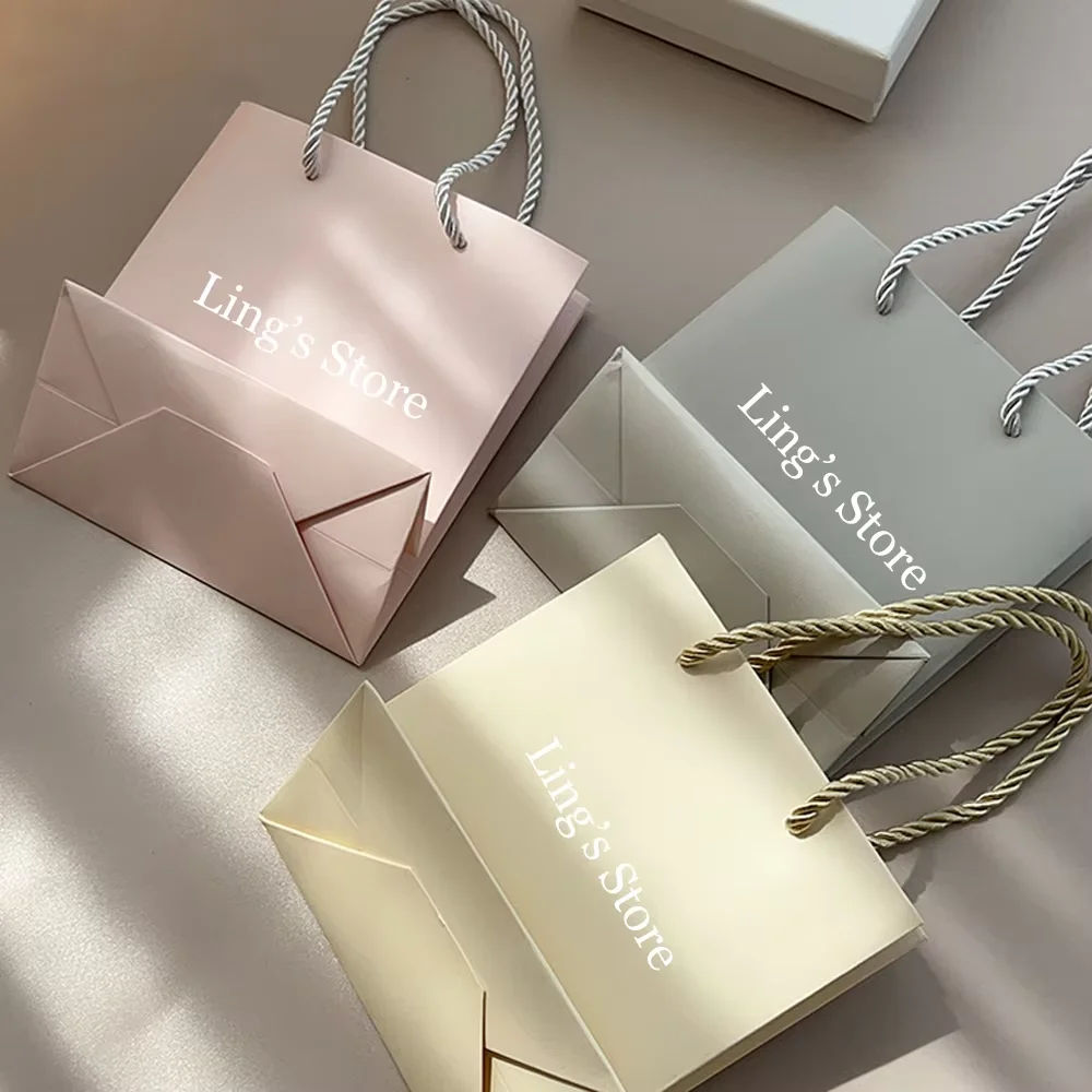 24/50/100pcs Borsa con manico per gioielli Logo personalizzato 14x15x7cm Confezione regalo di nozze Organizzatore di moda Shopping Sacchetti portatili da viaggio