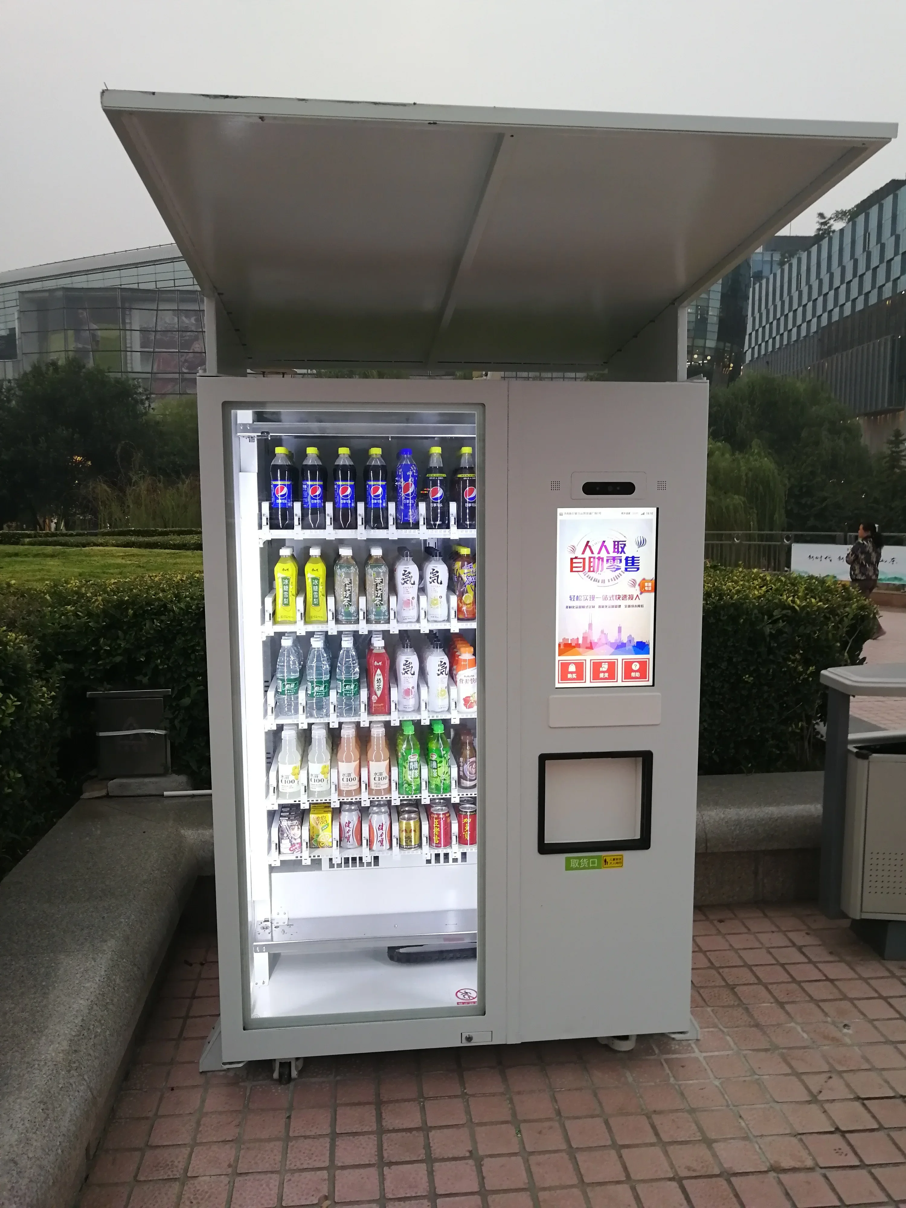 outdoor comb vending machine with canopy