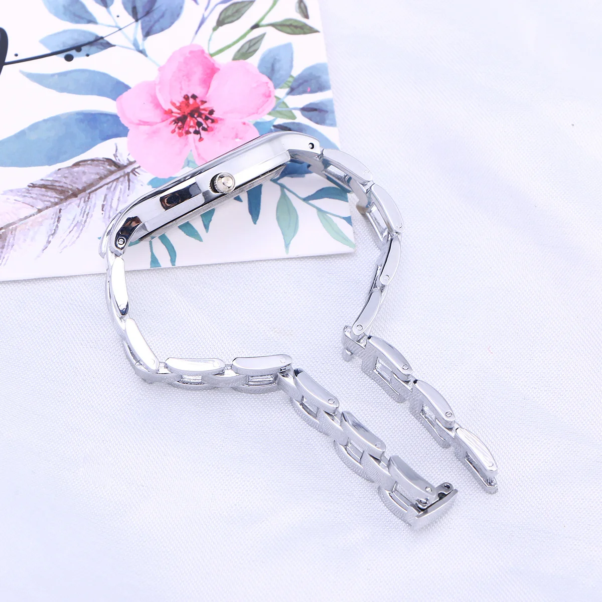 ساعة كوارتز عصرية للنساء باللون الفضي والأبيض، ساعة يد أنيقة وبسيطة تدوم طويلاً، مثالية لأي ملابس #6