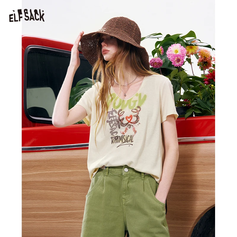 

ELFSACK Women's Casual Graphic T-Shirt with Graffiti Print & V-Neck, Oversized Knit Tee for Daily Wear, Streetwear Summer Top