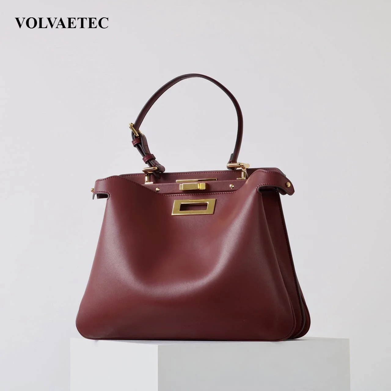 VOLVAETEC Autumn Winter New Metal Lock Kitten Bag Women Light Luxury High-end Real Leather Shoulder Handbag Commuting Versatile