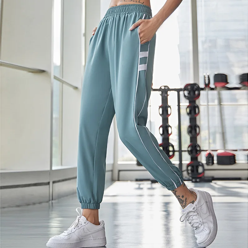 Pantaloni della tuta da donna pantaloni sportivi elastici a vita alta pantaloni da allenamento da corsa a righe laterali pantaloni da jogging per