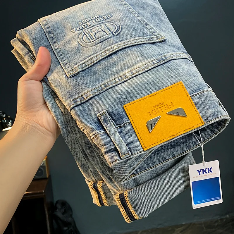 High-End Betaalbare Luxe Jeans Herenmode Persoonlijkheid Reliëf Taps Toelopende Mode Elastisch 2024 Nieuwe Veelzijdige Cropped Broek