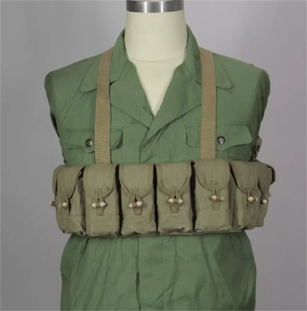 Original surplus supplies from the Vietnamese aid force 3521 manufactured 1970 Chicom 56 AK chest mounted ammunition package