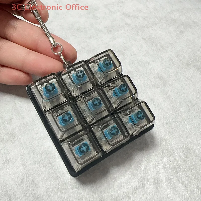 

9-Key Keyboard Keycaps Keychain – Fidget Toy For Anxiety Relief, Party Stress Relief, And DIY Fun