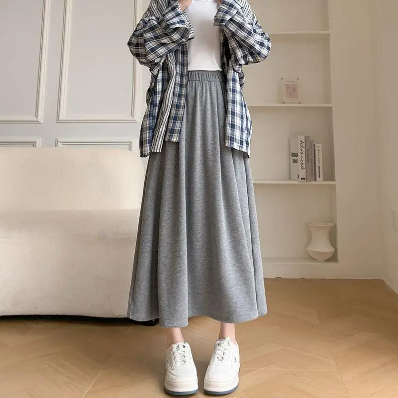 Gonna da ragazza Anni primaverili e autunnali Nuovo modello Gonna a ombrello di media lunghezza a vita alta Shorty Gonna lunga drappeggiata pigra Dopamina Hot