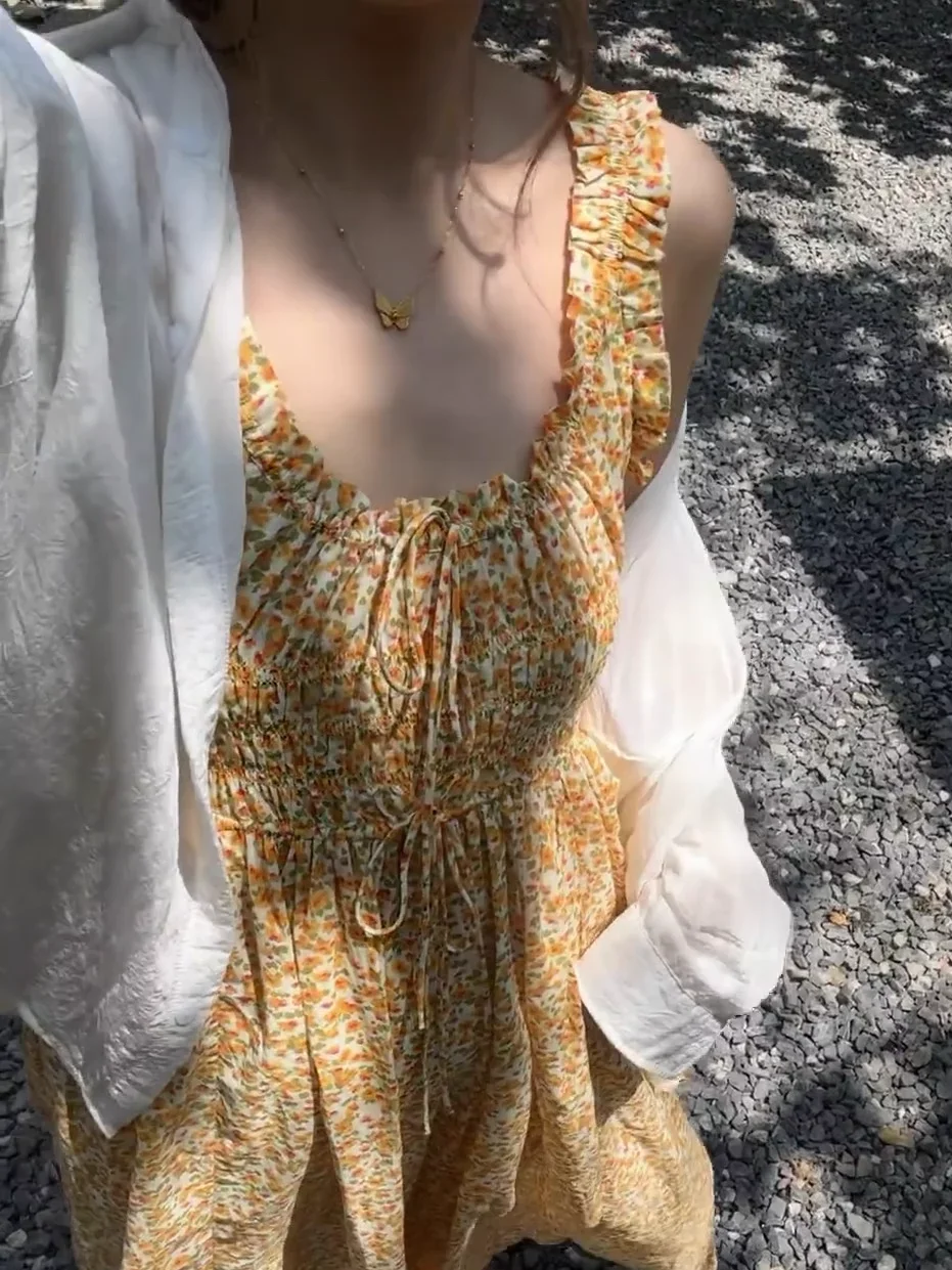 Abito lungo da donna in cotone con stampa floreale 2025 Nuovo abito da donna vintage senza maniche con elastico in vita smock