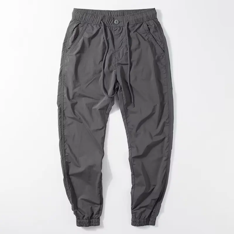 Pantaloni leggeri con risvolto elastico qui-dry Abbigliamento sportivo da uomo a vita sottile Abbigliamento da lavoro casual Protezione del lavoro Pantaloni lunghi resistenti all'usura