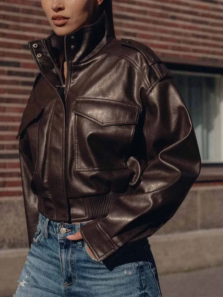 Stile europeo e americano autunno nuova moda abbigliamento da donna versatile giacca a maniche lunghe in similpelle lucida con colletto alla coreana