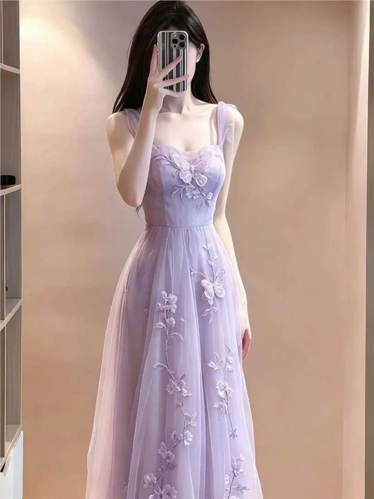 

A long elegant and gentle purple halter dress