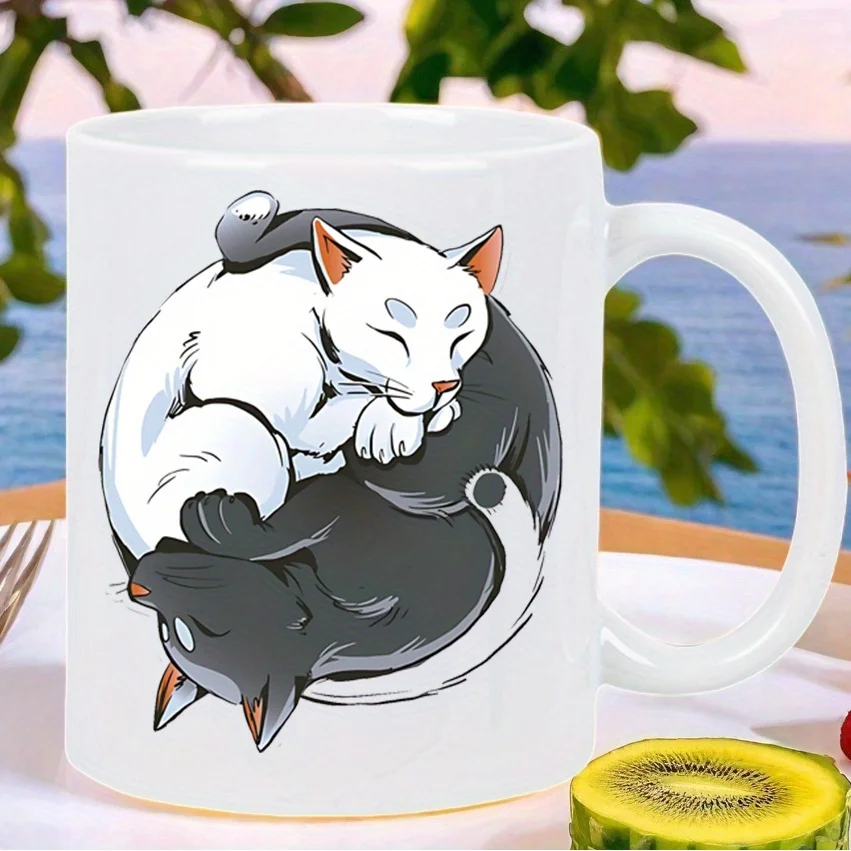 1pc  ceramic mug with a yin-yang black and white sleeping cat design, perfect for everyday use.