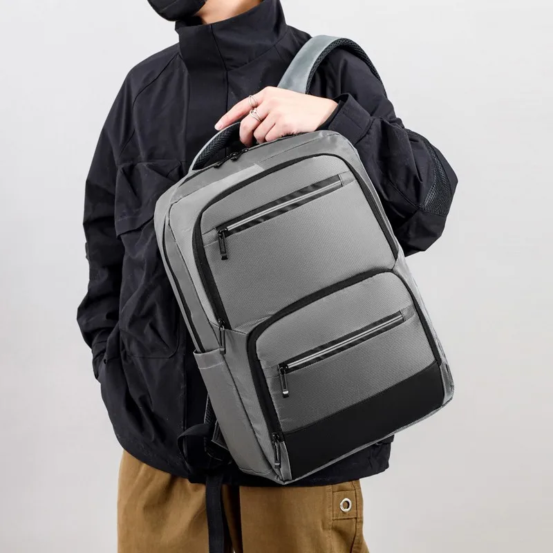 New multi-functional backpack men's fashion lightweight business handbag three-layer storage computer travel backpack.