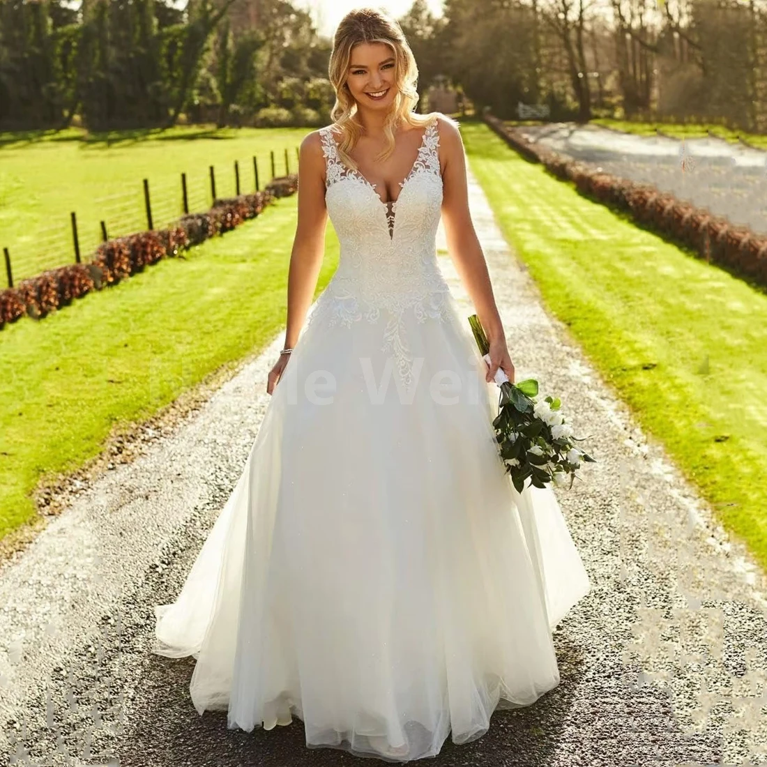 

Elegant Sleeveless V-Neck Wedding Dress with A-Line Skirt and Lace Appliques for Bride Customized