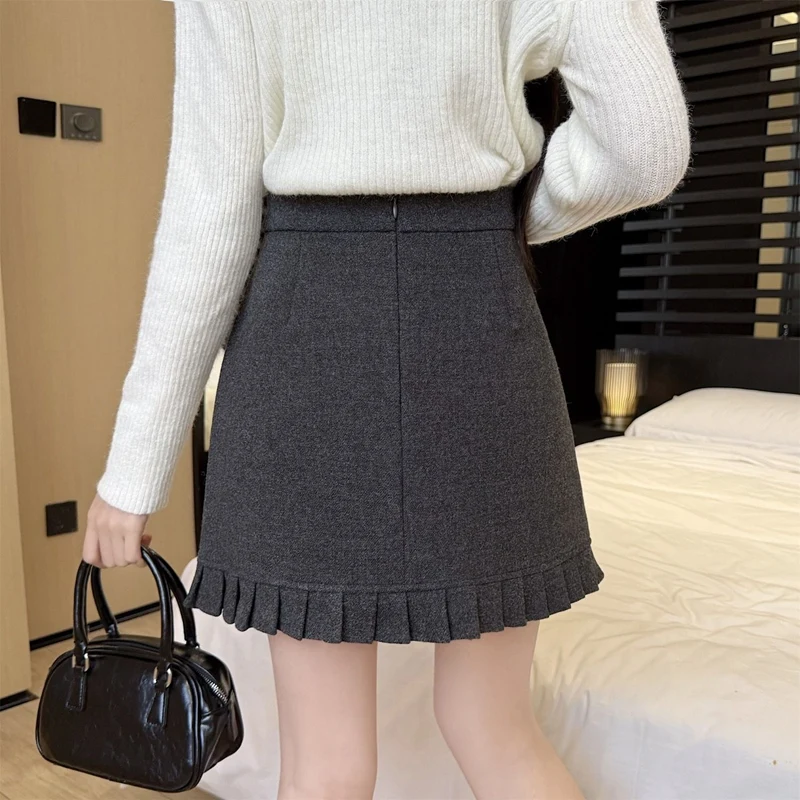 تنانير مزيج الصوف السميك الدافئ لخريف وشتاء 2025 للنساء تنورة كورية لطيفة عالية الخصر بقصة ضيقة ومزاجية فستان أنيق