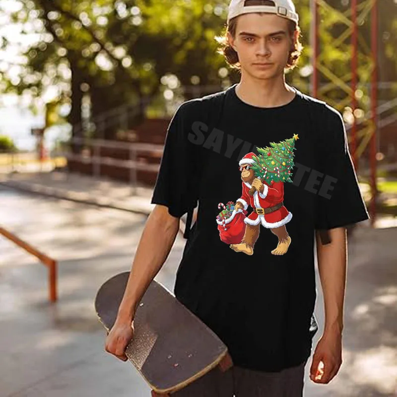 Bigfoot Christmas Tree Lights Boys Men Sasquatch Lovers Xmas T-Shirt Y2k Fashion Holiday Party Clothes Rock Funny Novelty Gift