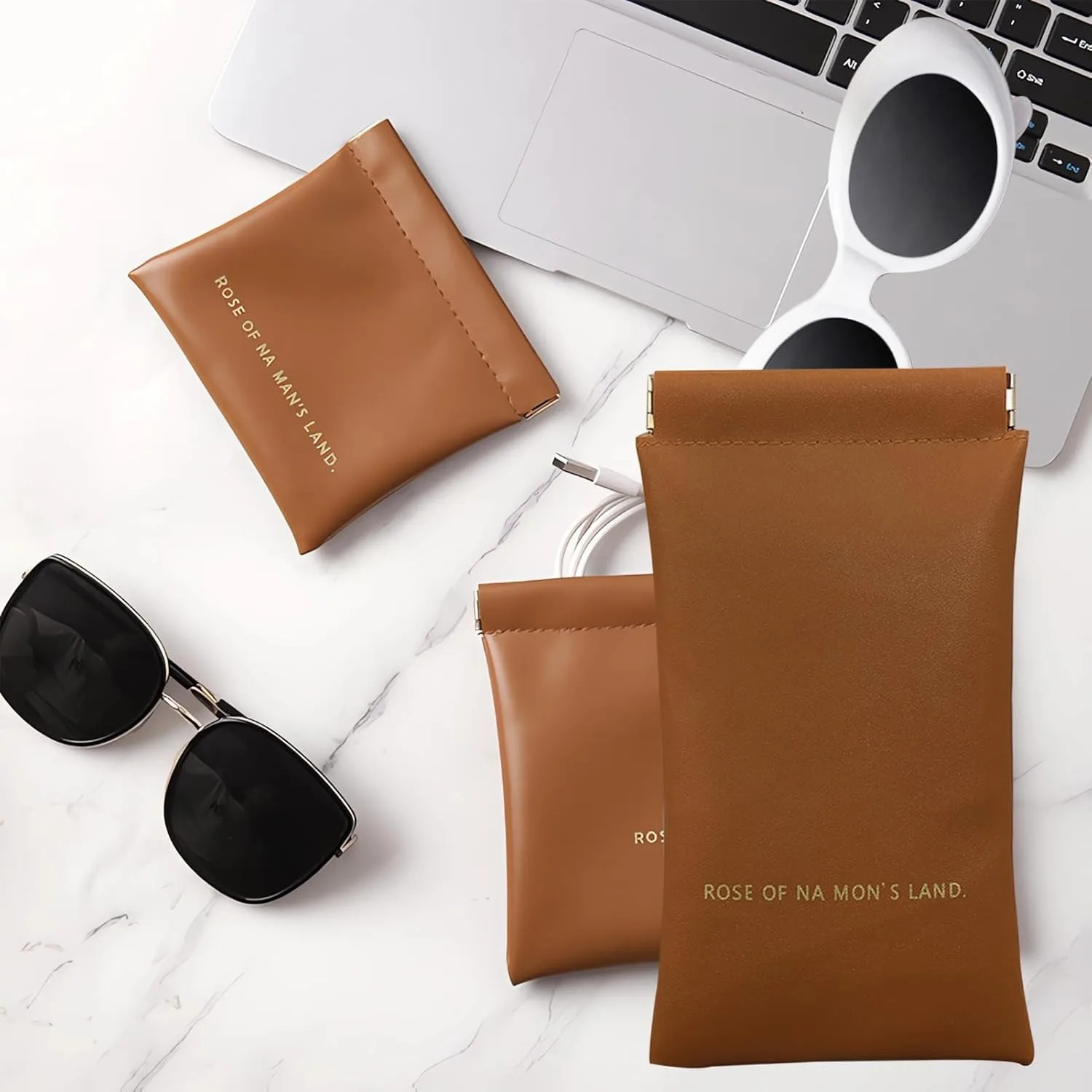 Set of Three Brown Leather Makeup Pouches