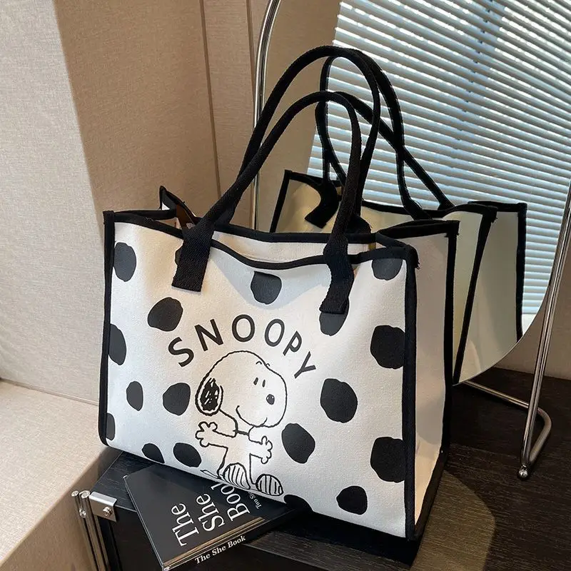 Ms. Snoopy\'s new fashionable and personalized cartoon print simple and versatile large-capacity one-shoulder portable canvas bag