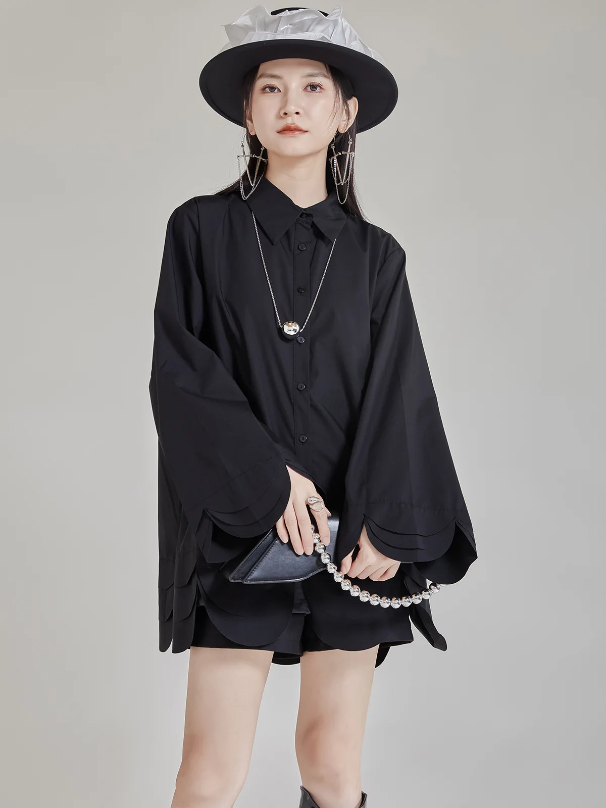 Chemise à manches pétales pour femmes, ourlet Ultra large, décoration de boutons, haut mi-long en coton, élément de mode Simple, chemise de styliste pour femmes