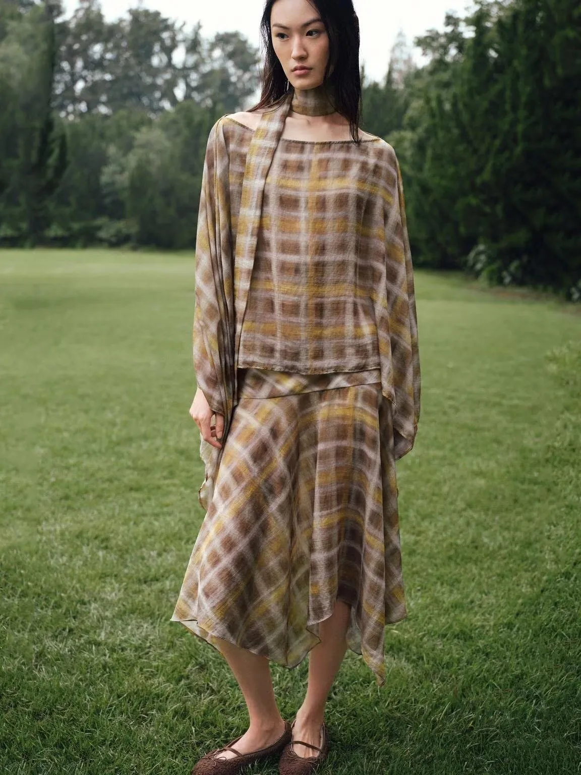 

Новинка! Осенняя женская юбка миди в клетку ZA2025: привлекательная, повседневная, со средней талией, асимметричным подолом, принтованная, из других материалов.