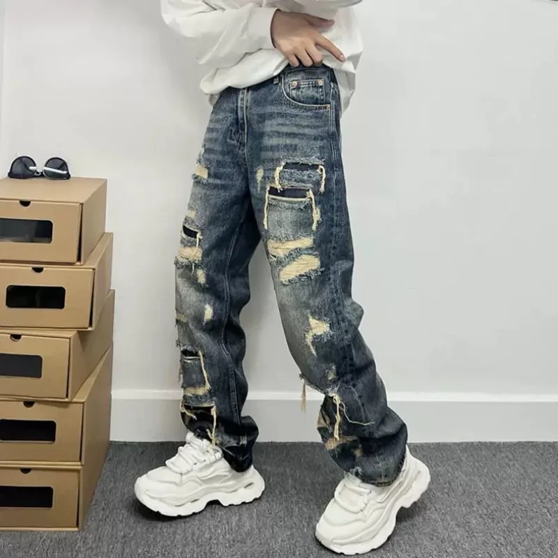 

Роскошные мужские джинсы, оригинальные красивые джинсы с нашивками с большими дырками, мужские прямые свободные длинные брюки, модные уличные брюки-жебраки