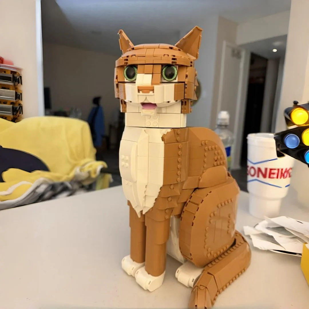 

1755pcs Disney Orange Cat Creative Pet Animal Kit for Adults Model 76269 Building Blocks Bricks Toys Kid Gifts