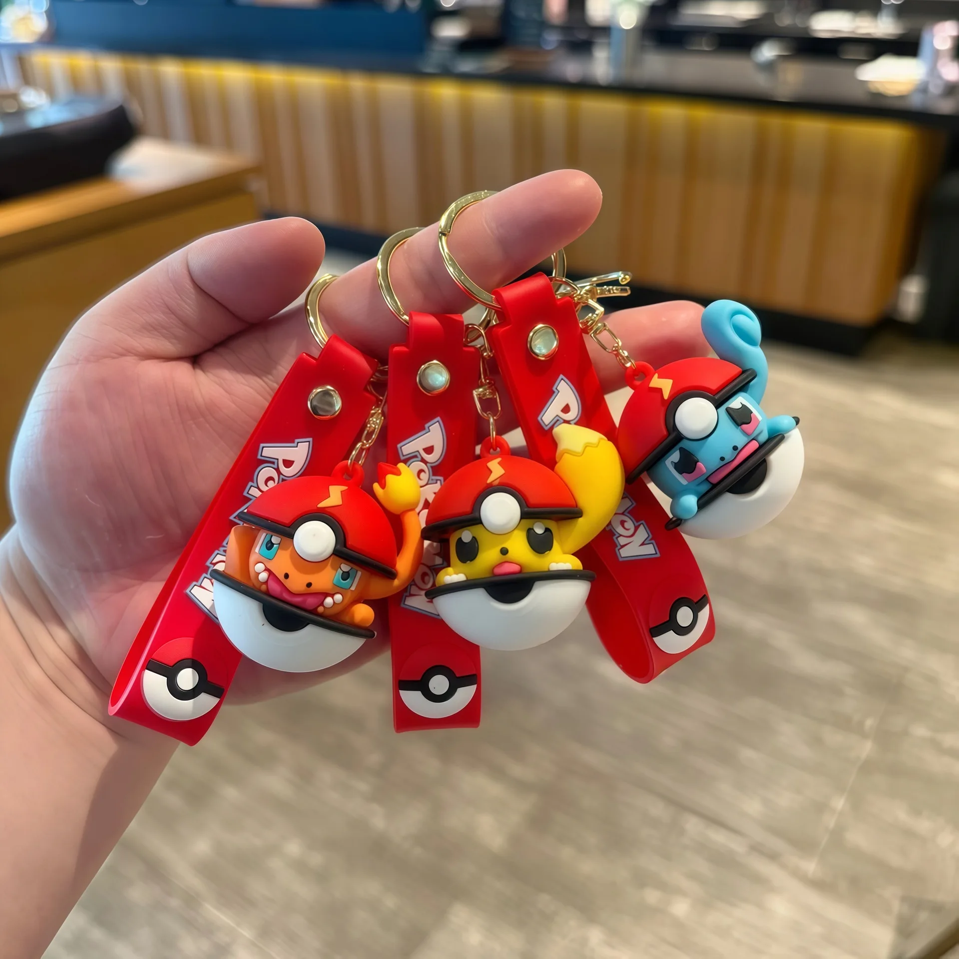Pokémon Gift Idea - Pikachu Poké Ball keychain.  A thoughtful gift for any Pokémon lover.  Add charm to your keys