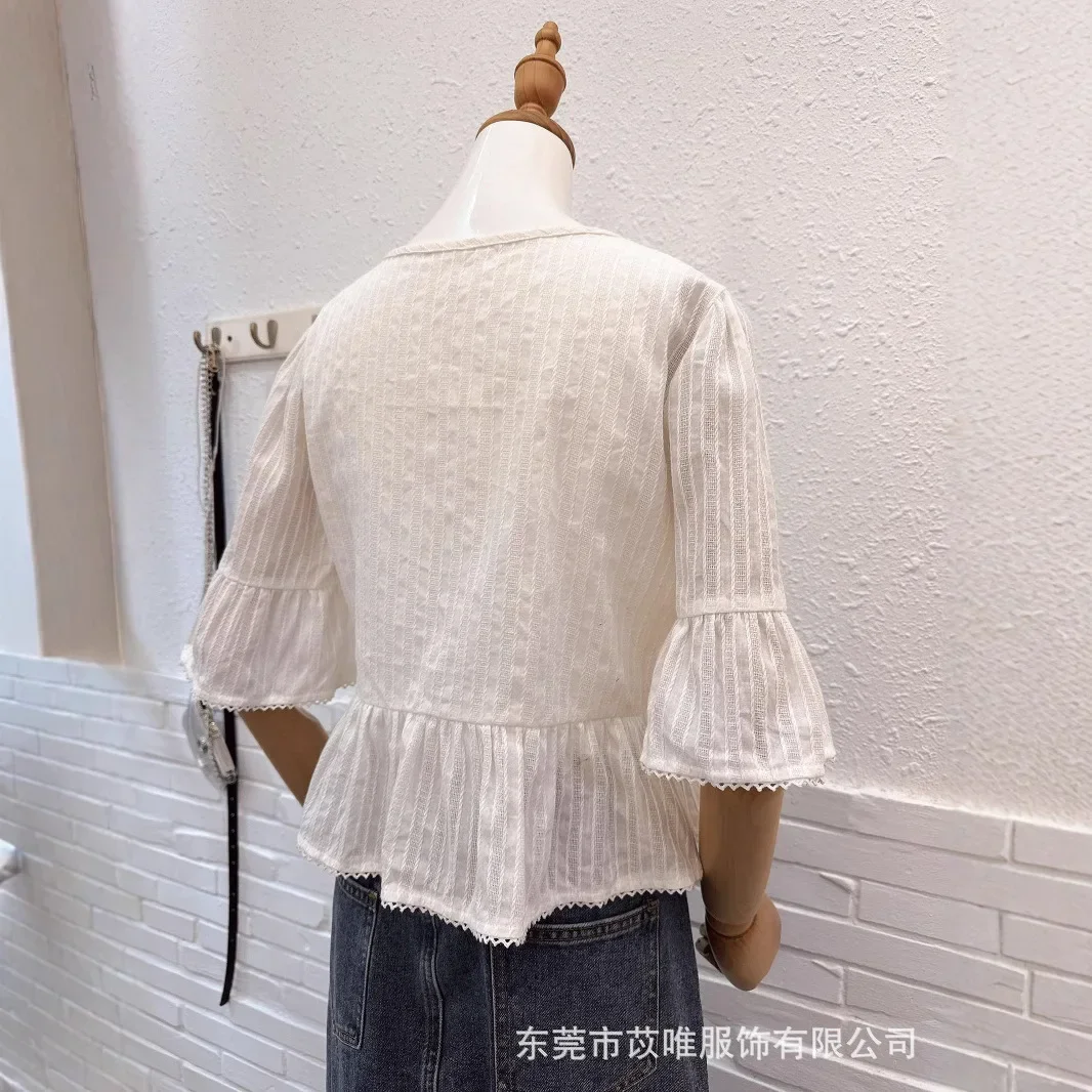 

Early spring French lace doll shirt women's sweet age-reducing lace-up waist horn sleeve V-neck shirt