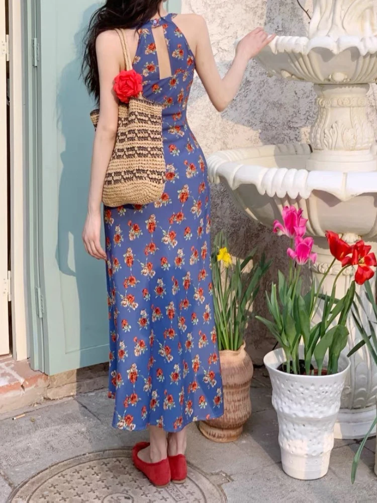 Abito floreale da donna con atmosfera di temperamento dimagrante con scollo a V blu in stile retrò Hong Kong