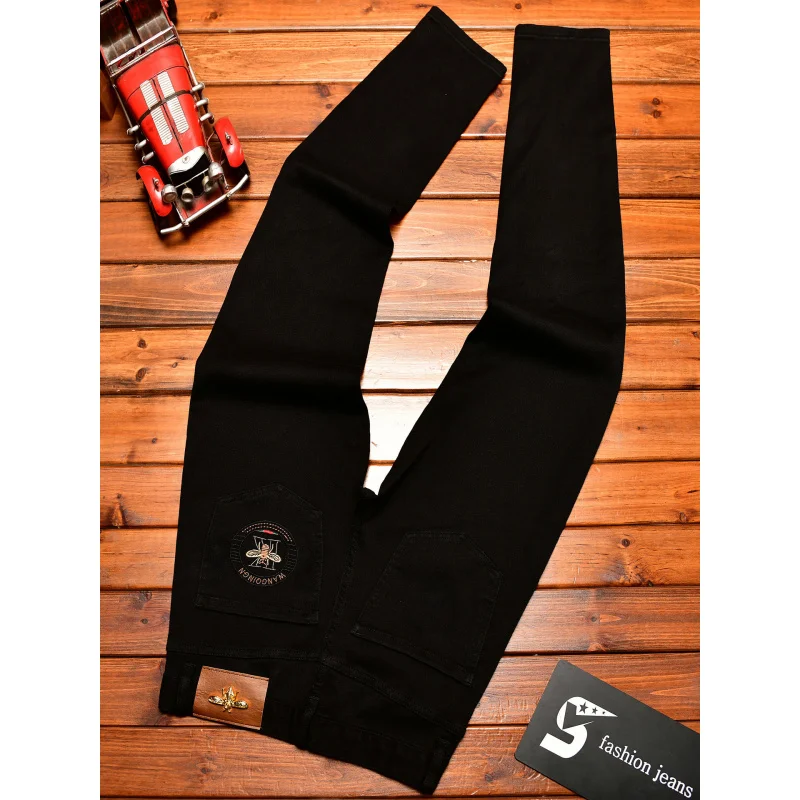 高級黒ジーンズ メンズ 秋 ライトラグジュアリー トレンド メンズ服 細身 刺繍プリント カジュアルパンツ